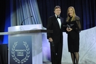 Susan Lehrman accepts the 2012 President's Award from Dr. Kerwin.
